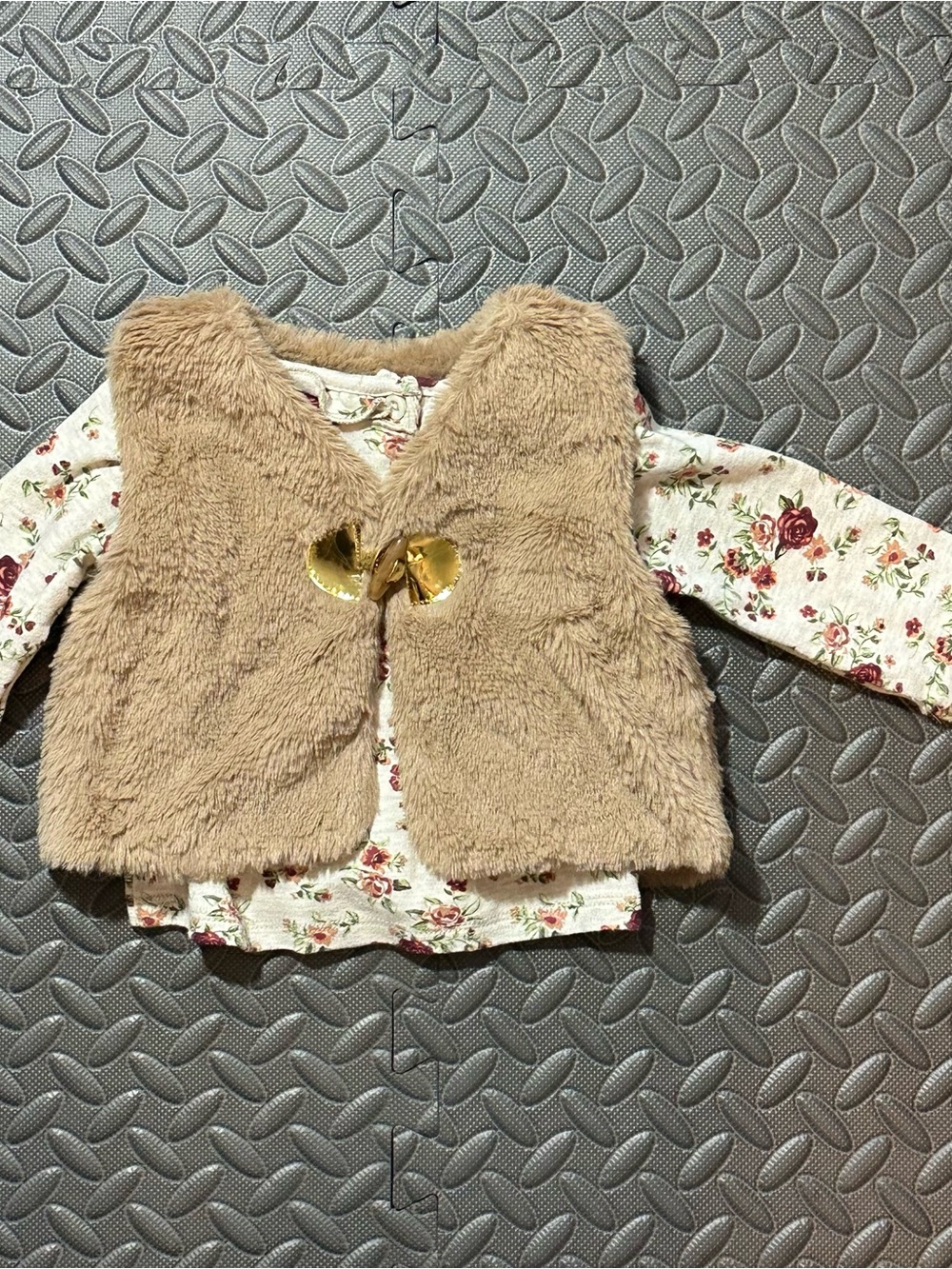 Nicole Miller Tan Faux-Fur Vest with gold closure detail and long sleeve floral